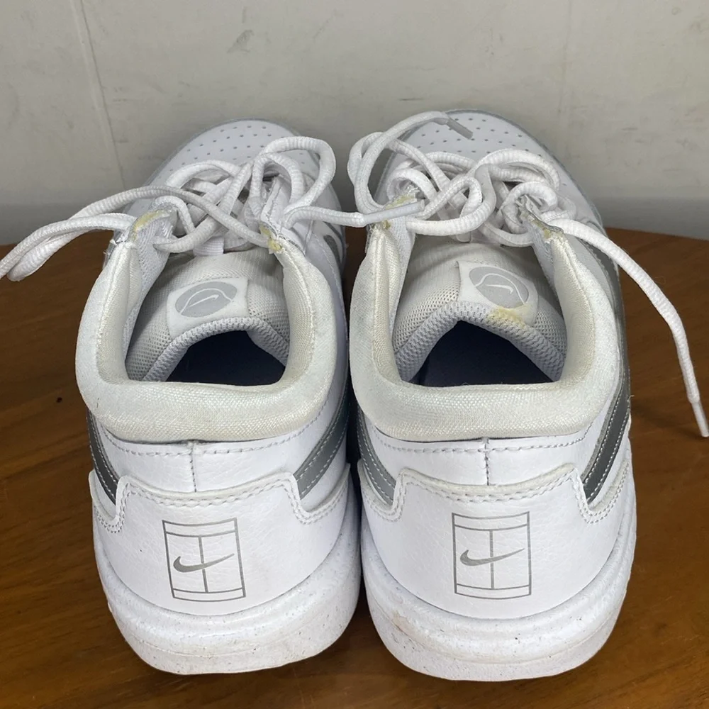 Nike White Sneakers with Silver Swoosh